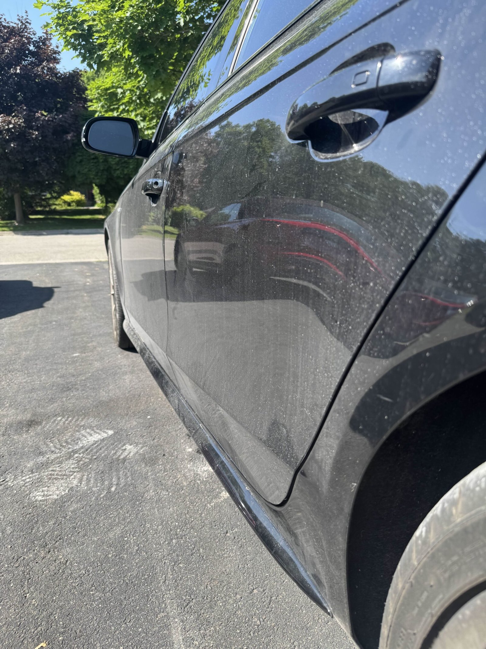 Close-up of dirty Audi S4 driver door
