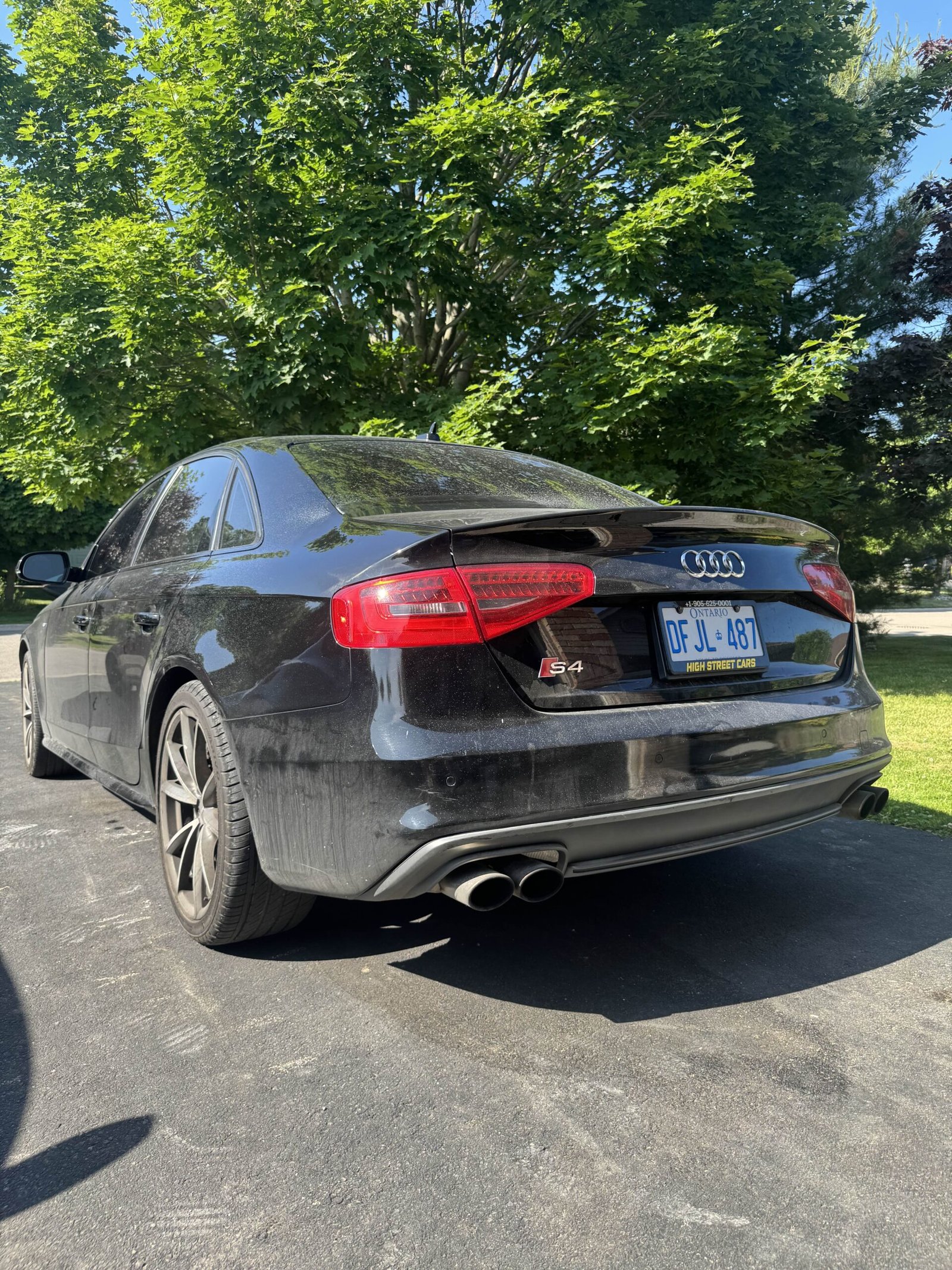 Dirty rear view of Audi S4 pre-wash